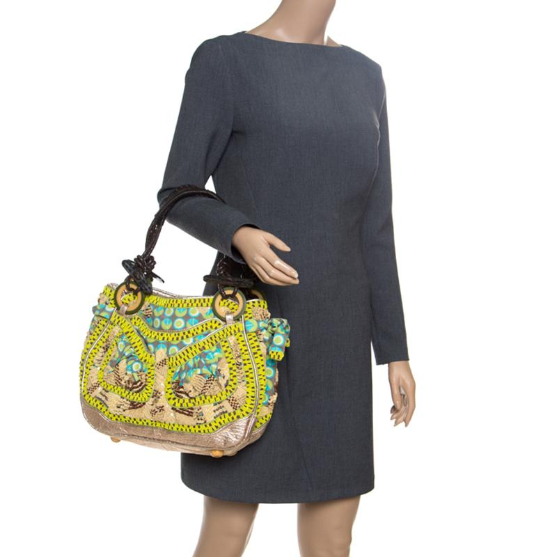 Every feature on this shoulder bag from Jamin Puech is awe-inspiring which makes the creation worthy of being owned. It has been crafted from fabric and leather and styled with multicoloured bead and sequin embellishments. The bag has braided