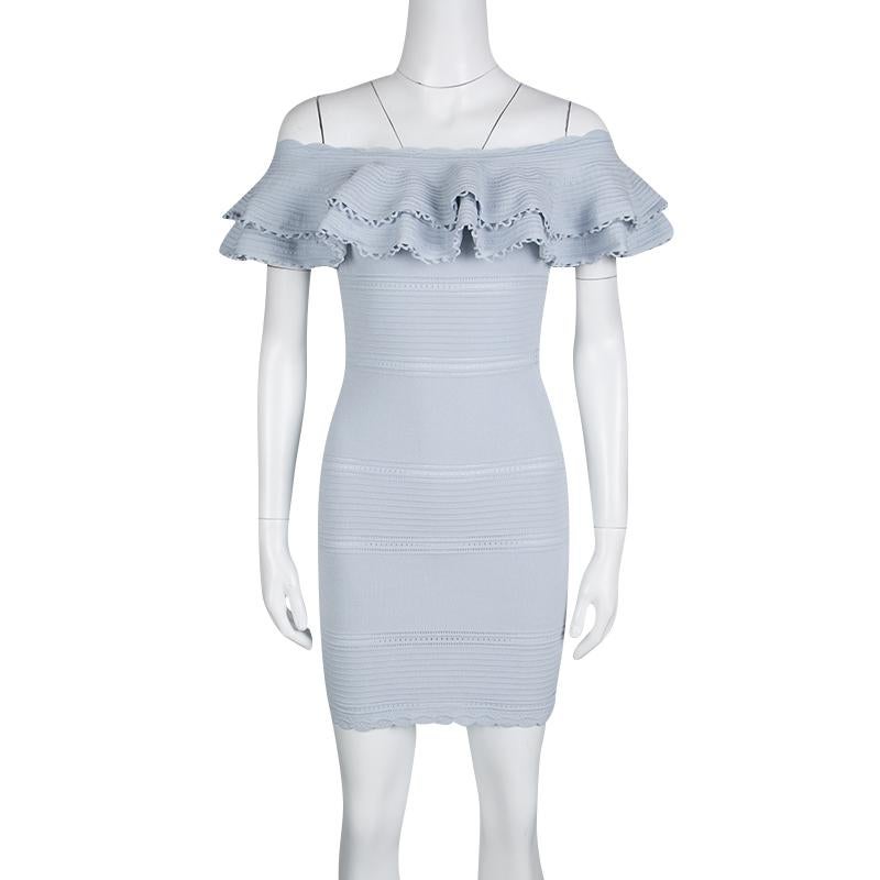 Alexander McQueen's blue dress is a breezy, romantic outfit that can be worn for parties and dinners. Featuring perforated knitting, the off-shoulder design is adorned with beautiful ruffle detail. Cut to a short length in a fitted shape; you can