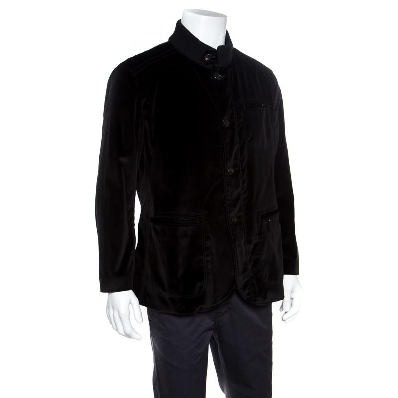 Become a trendsetter and make a fashion statement with this wonderful jacket from Armani Collezioni. The jacket is made of velvet and it features a knit collar, long sleeves and front buttons. This creation is perfect to keep you warm and on-style