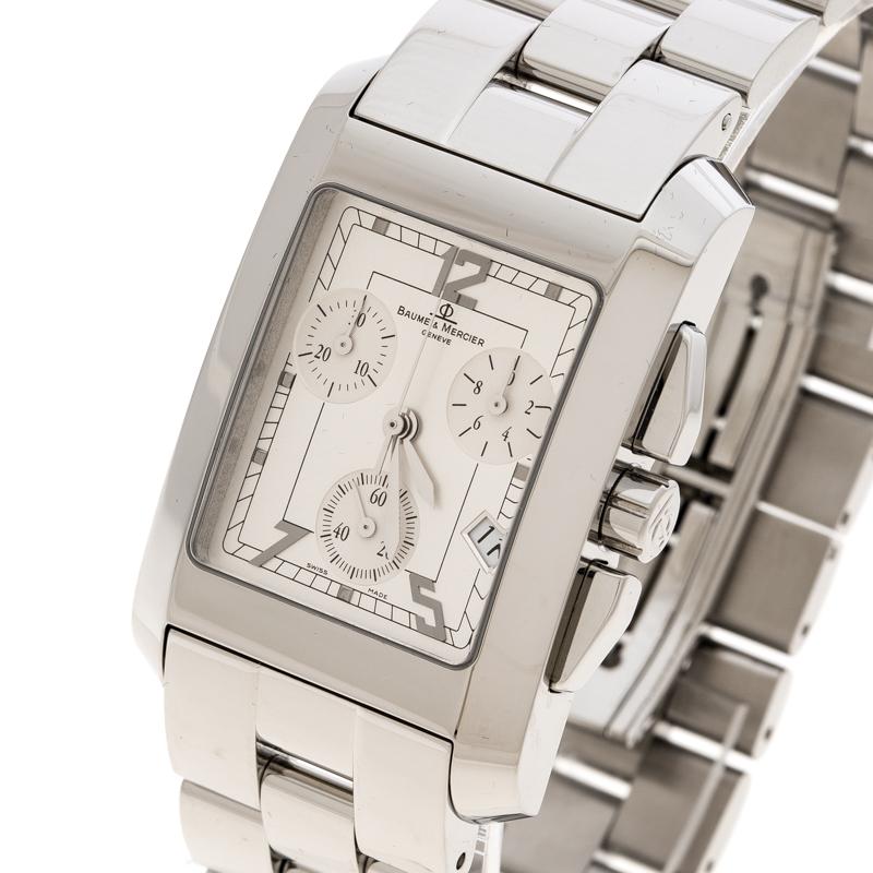 Exhibiting the brand's eye for timeless style and redefined design, this Hampton wristwatch is a unique piece. In a stainless steel case, it has a rectangular dial featuring two matching hands and a date window at four o' clock position. A