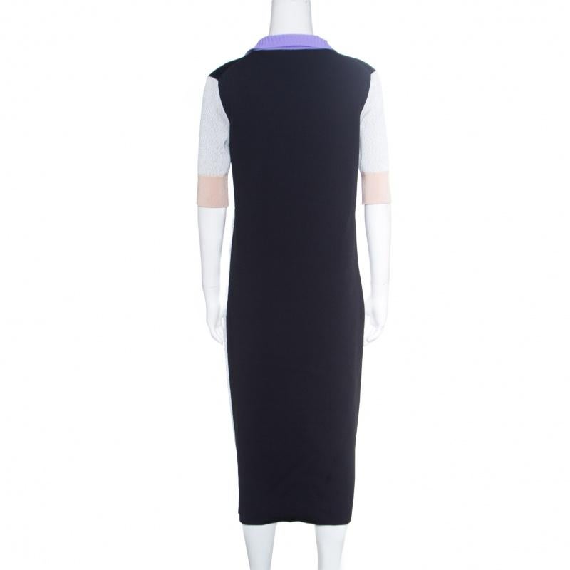 In a perfect blend of modern style and feminity, this dress from Balenciaga's Spring 2015 Ready-to-Wear is a creation for every woman's closet. With a colorblock design and a midi-hem, the shift dress is a winner with high heels and flats as