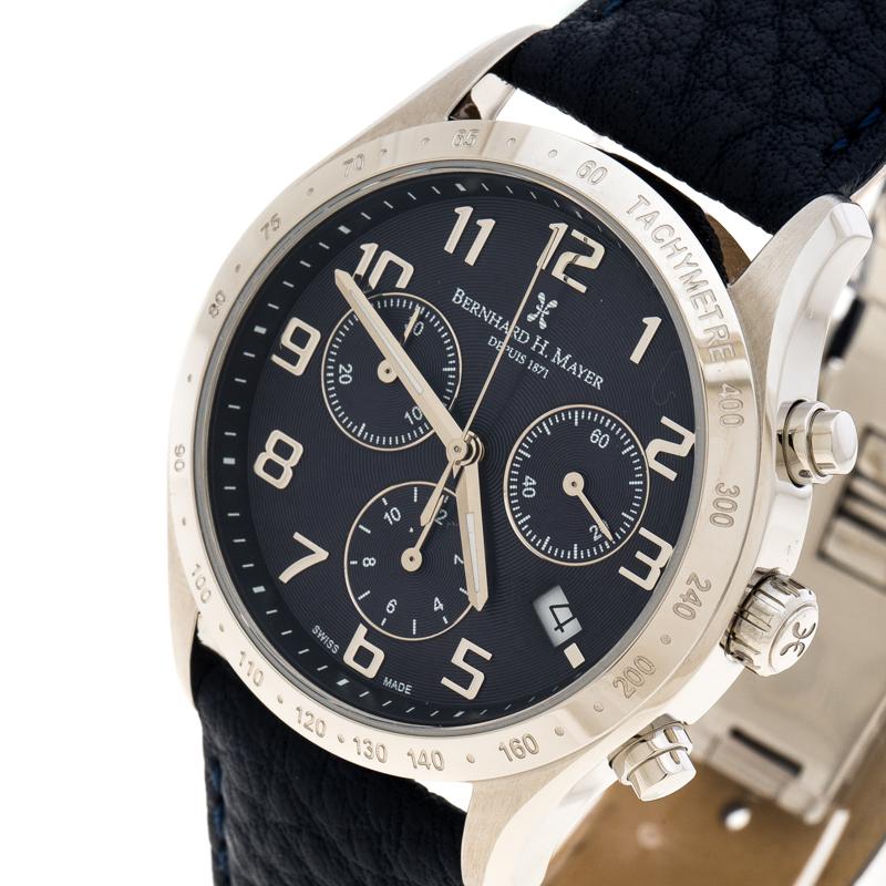 This Iris Chronograph wristwatch from Bernard H. Mayer will be your ultimate companion on those business meetings and trips. Crafted from stainless steel, the chronograph watch features tachymeter on the round bezel and a blue, textured dial which