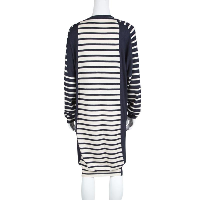 We are in love with this sweater dress from Balenciaga as it is stylish and warm at the same time. It is made from cashmere and silk and it flaunts a round neck, long sleeves, and stripes in navy blue and cream all over.

Includes: The Luxury Closet