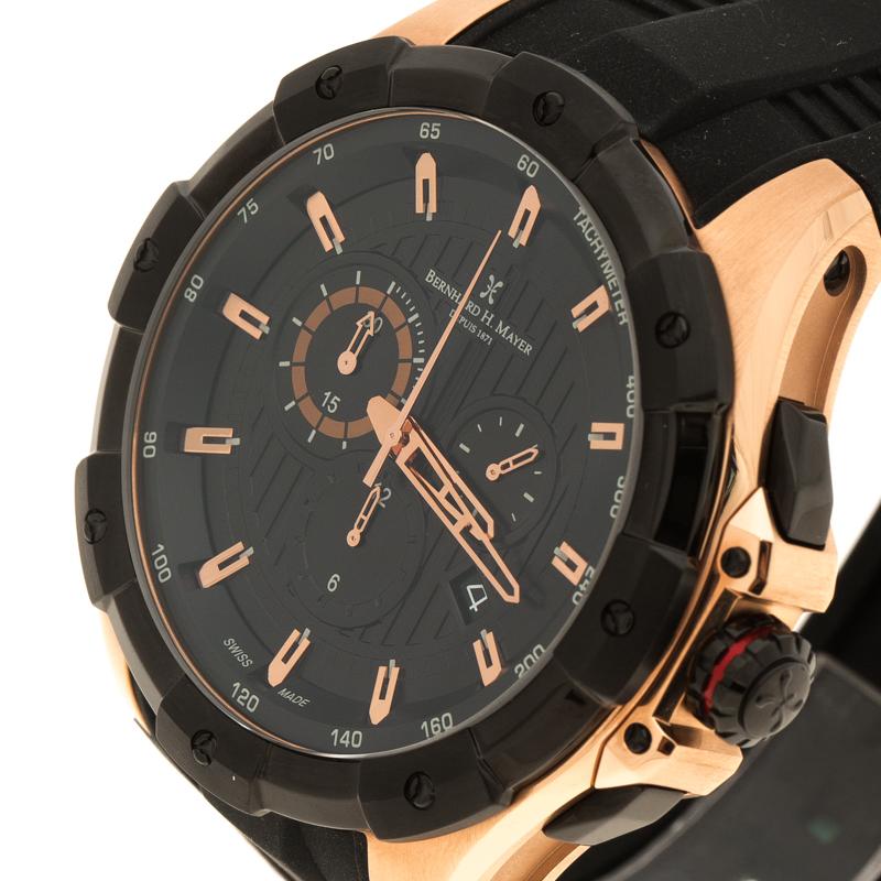 A sporty and extremely stylish piece of accessory from Bernhard H. Mayer, this Victor chronograph watch is perfect for those casual chic and casual looks. Featuring a black rubber strap with a rubber and rose gold plated stainless steel case, this