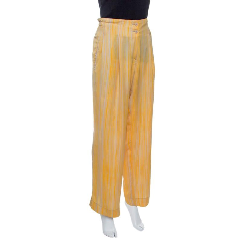 Trade your standard, everyday bottoms for these lovely pants from Bottega Veneta. It is cut to a comfy shape featuring yellow and grey striped pattern all over. Complete with a zip fastening, these can be paired with your tees and tops for a trendy