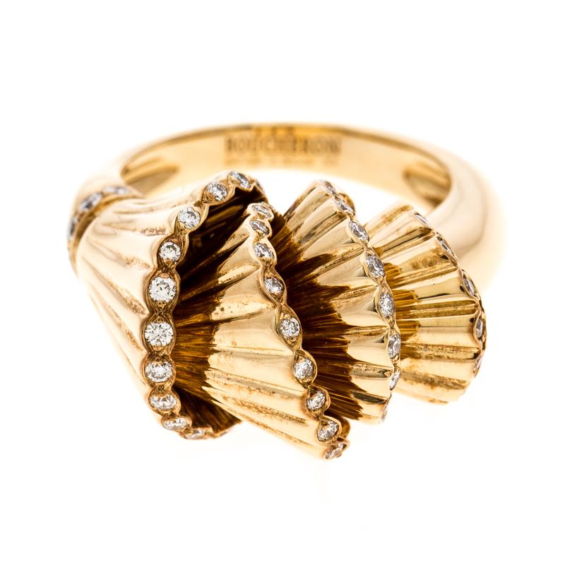 It is definitely Love At First Sight with this Boucheron ring from their Frou Frou collection. Beautifully crafted from 18k yellow gold, it is detailed with pleated cones, a design achieved through careful attention and skill. To add more value and