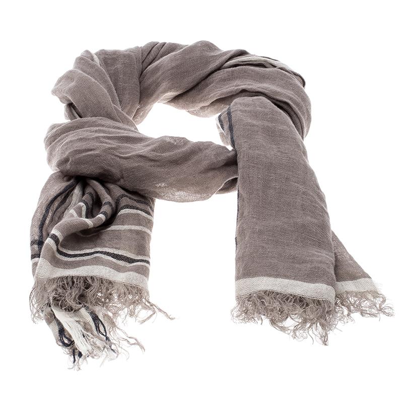 Brunello Cucinelli brings you a warm and cozy option to help your fight against the weather. This scarf is designed with contrast stripes on the body, that also works as a great accessory and reflects your impeccable sense of style. The linen fabric
