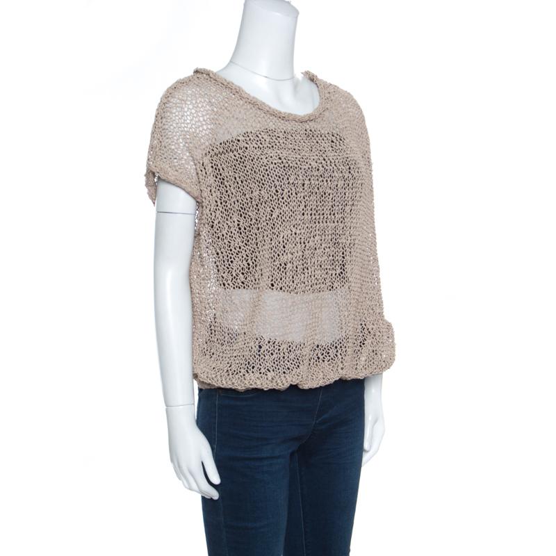 Brunello Cucinelli brings to you this fabulous oversized top that is sure to fetch you compliments from one and all. The brown creation is made of faux suede and features an open knit design. It flaunts a round neckline and short sleeves. Pair it