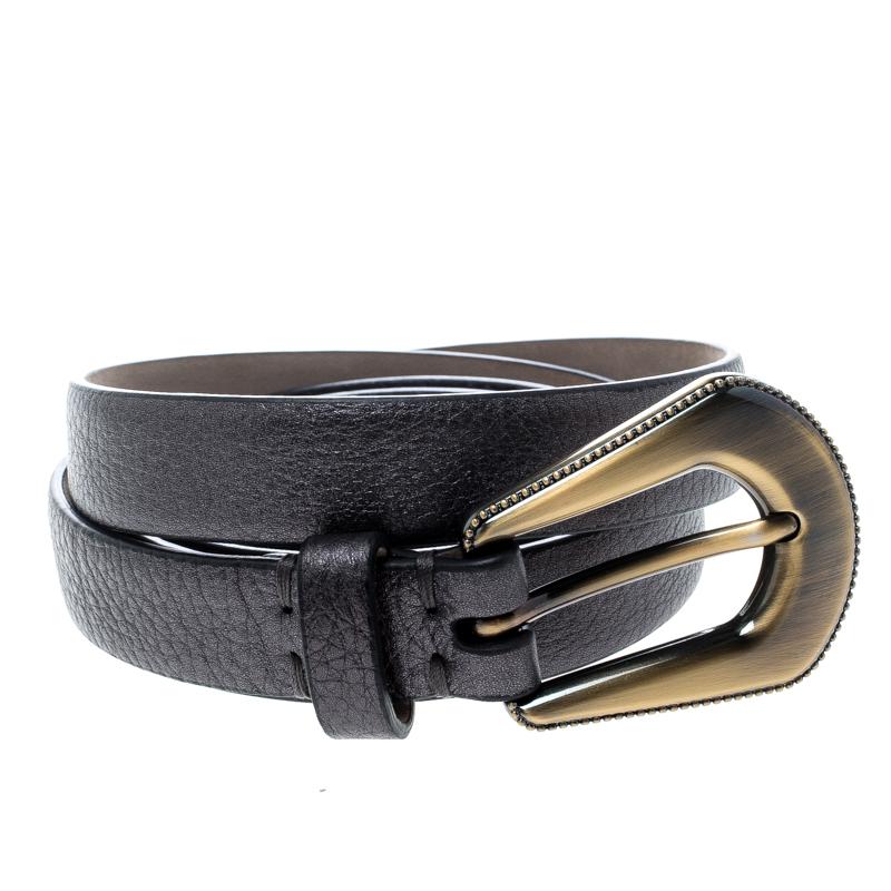 Accessorise right with this belt from Brunello Cucinelli. It has been crafted in Italy from metallic grey leather and styled with a pin buckle in gold tone. This piece can be worn with all your formals.

Includes: Original Dustbag, Info Booklet,