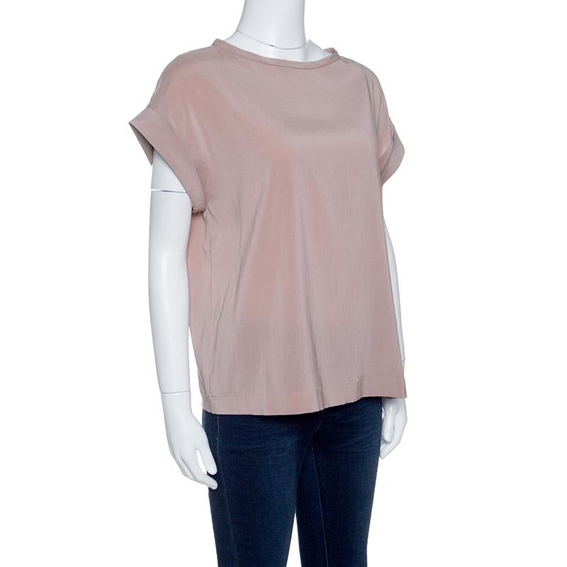 Beautifully made, this Brunello Cucinelli top is designed in pale pink with folded short sleeves and a round neckline. The creation will surely add a nice touch to your wardrobe.

Includes: The Luxury Closet Packaging

