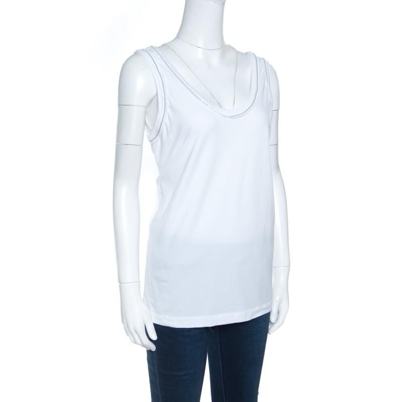 Simple and sophisticated is what defines this tank top from Brunello Cucinelli. The white top is made of a cotton blend and features a scoop neckline, monili trim detailing and a well-defined silhouette. Sure to lend you a great fit, this creation