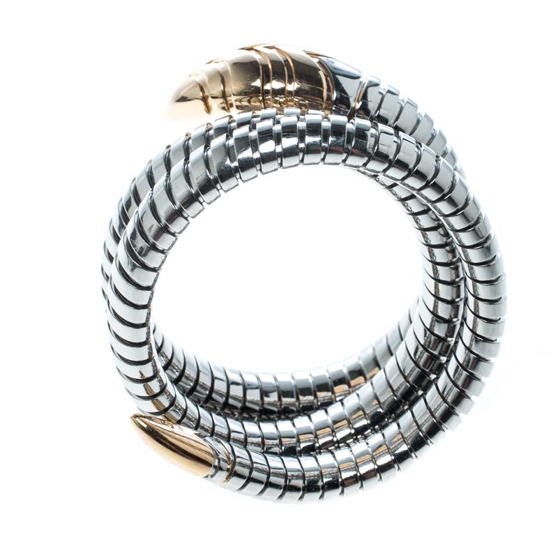 Exuding glamour and unique style, the bracelet is a melange of Bvlgari's two most iconic designs, the Serpenti and Tubogas. The stainless steel body, spiralled twice, featuring the fine lines of Tubogas technique represents the sensual curves of a