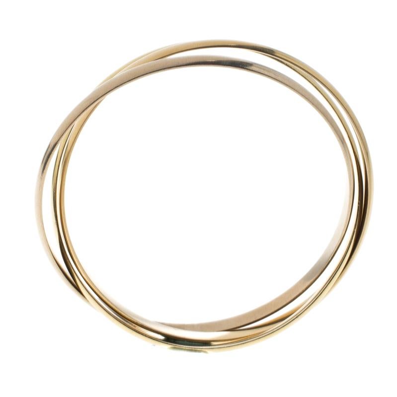 Cartier Trinity De Cartier 18k Three Tone Gold Rolling Bangle Bracelet In Good Condition In Dubai, Al Qouz 2