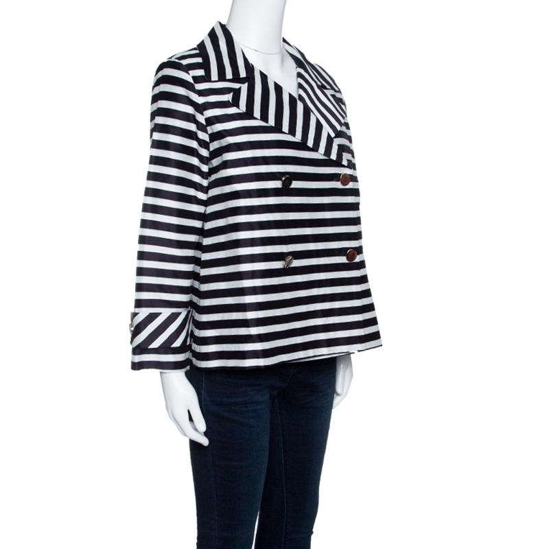 This jacket from CH Carolina Herrera is crafted in a cotton and silk blend featuring long sleeves and two external pockets. It carries a navy blue and white striped pattern and double-breasted style. It can be paired with statement skirts and high