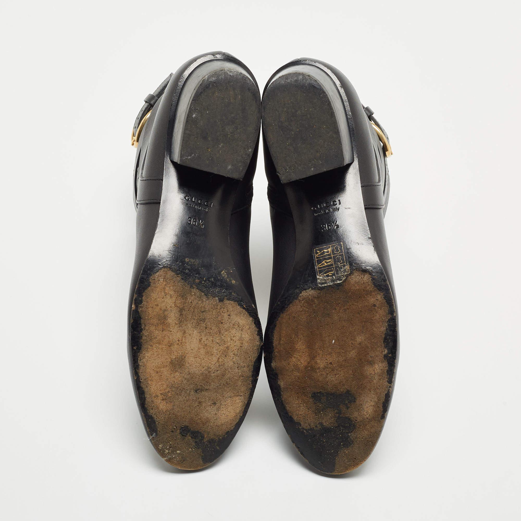 Gucci - Bottines à boucle en cuir noir en vente 3