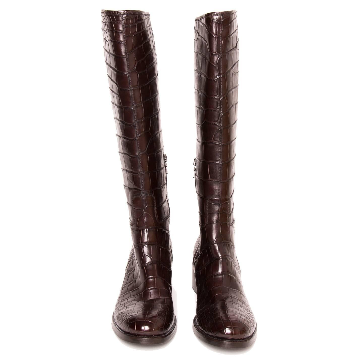 Dark brown crocodile knee high boots with round toe, narrow fit and instep zipper. Made in Italy. Heel 1.75”.

Size 40 Italian sizing

Condition Excellent: never worn