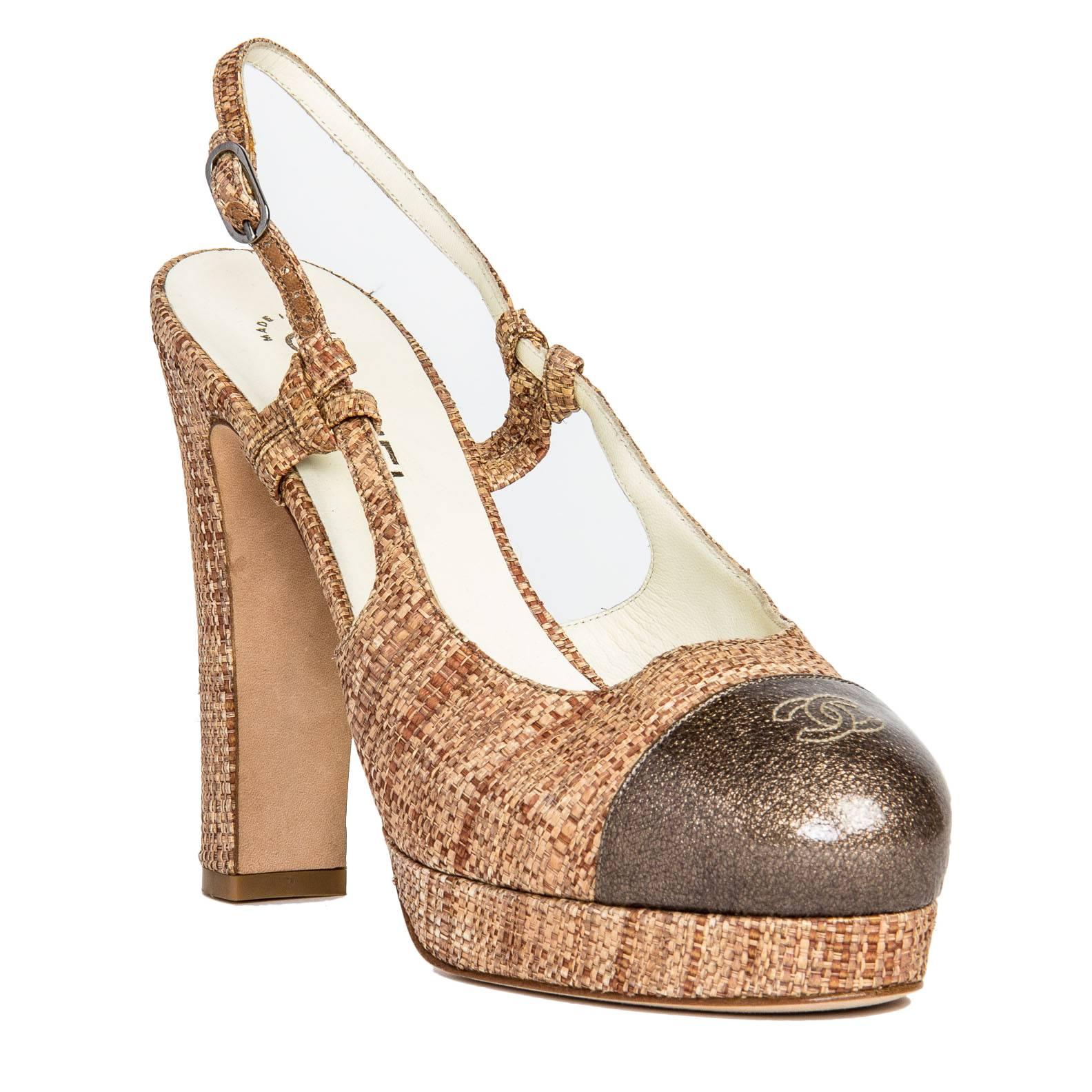 Splendid rattan and leather sling back platform sandals with bronze round cap toe detail enriched by a Chanel logo. Made in Italy. Heel 5.25".

Size  41 Italian sizing

Condition  Excellent: never worn
