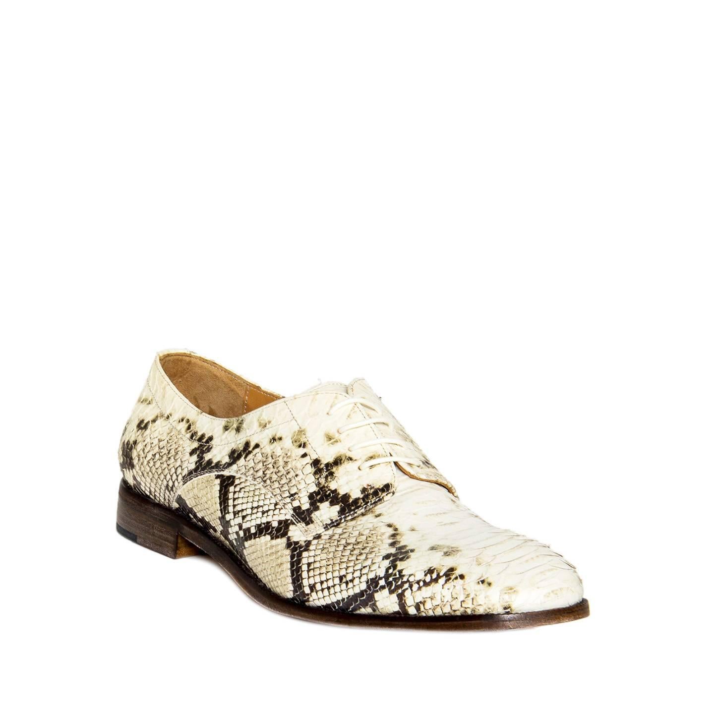 Ivory and brown python lace up oxfords. On the inner sole label is written that these shoes are a reproduction of man's calfskin shoes made in Marseille, France in 1964.  Vero cuoio. Made in Italy. Heel 1