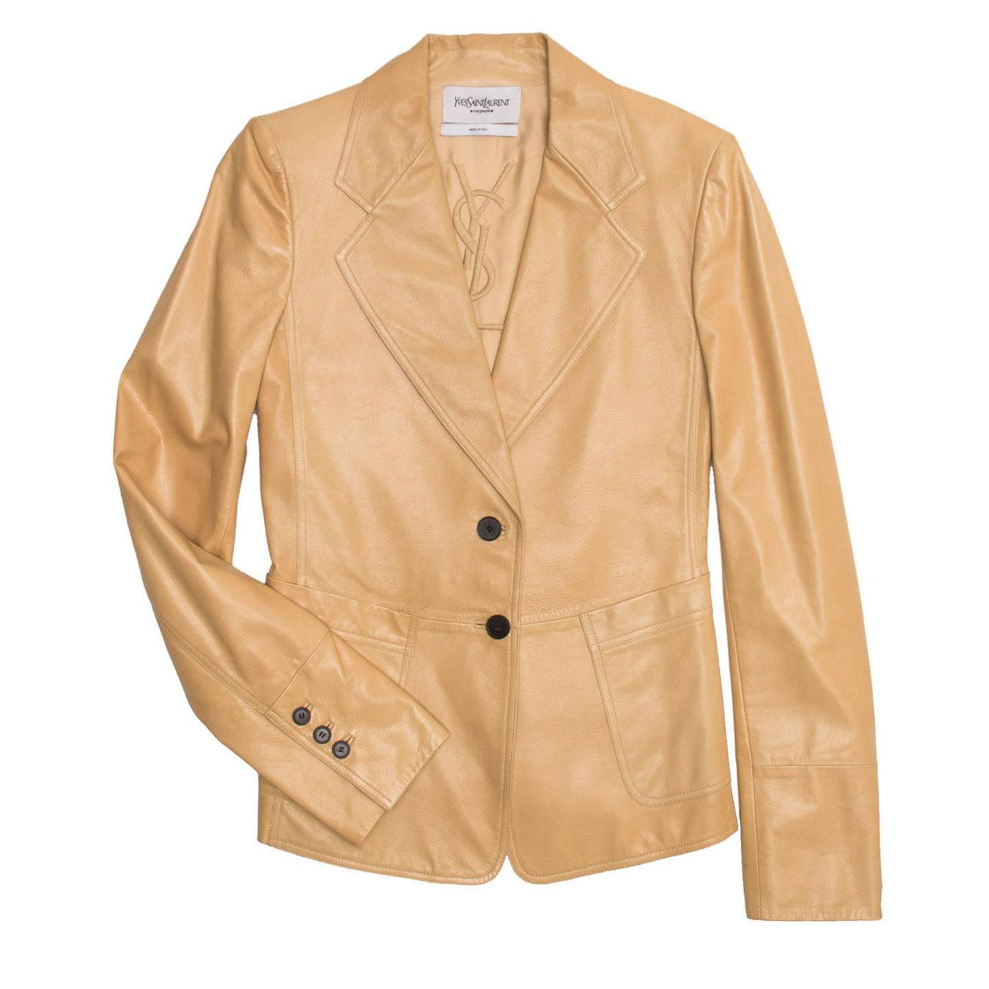 Camel colored fitted two button kangaroo leather blazer.

Size  40 French sizing

Condition  Excellent: worn once