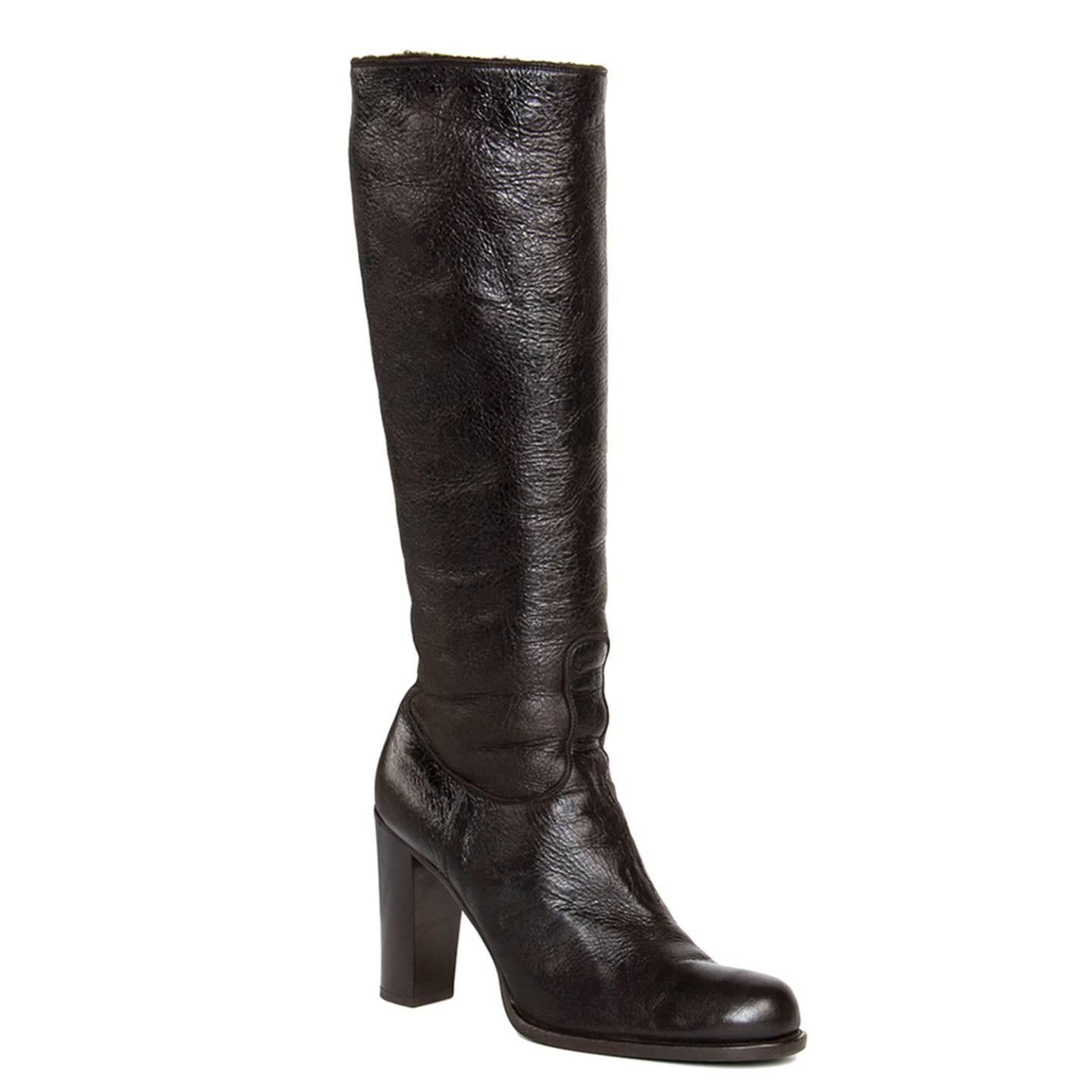 Dark brown leather shearling knee high boots with round toe with instep zipper. Vero cuoio. Made in Italy. Heels 4