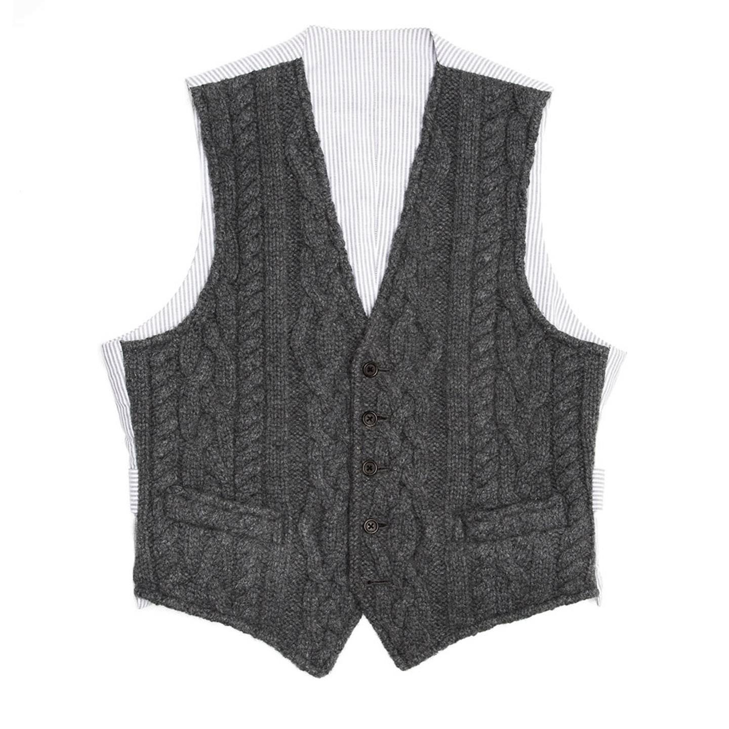 Fall 2009 dark grey cable knit cashmere vest with grey & white striped cotton back panel and adjustable buttoned back detail. Made for Men Worn by Women too. Made in U.S.A.

Size  1

Condition  Excellent: worn a few times