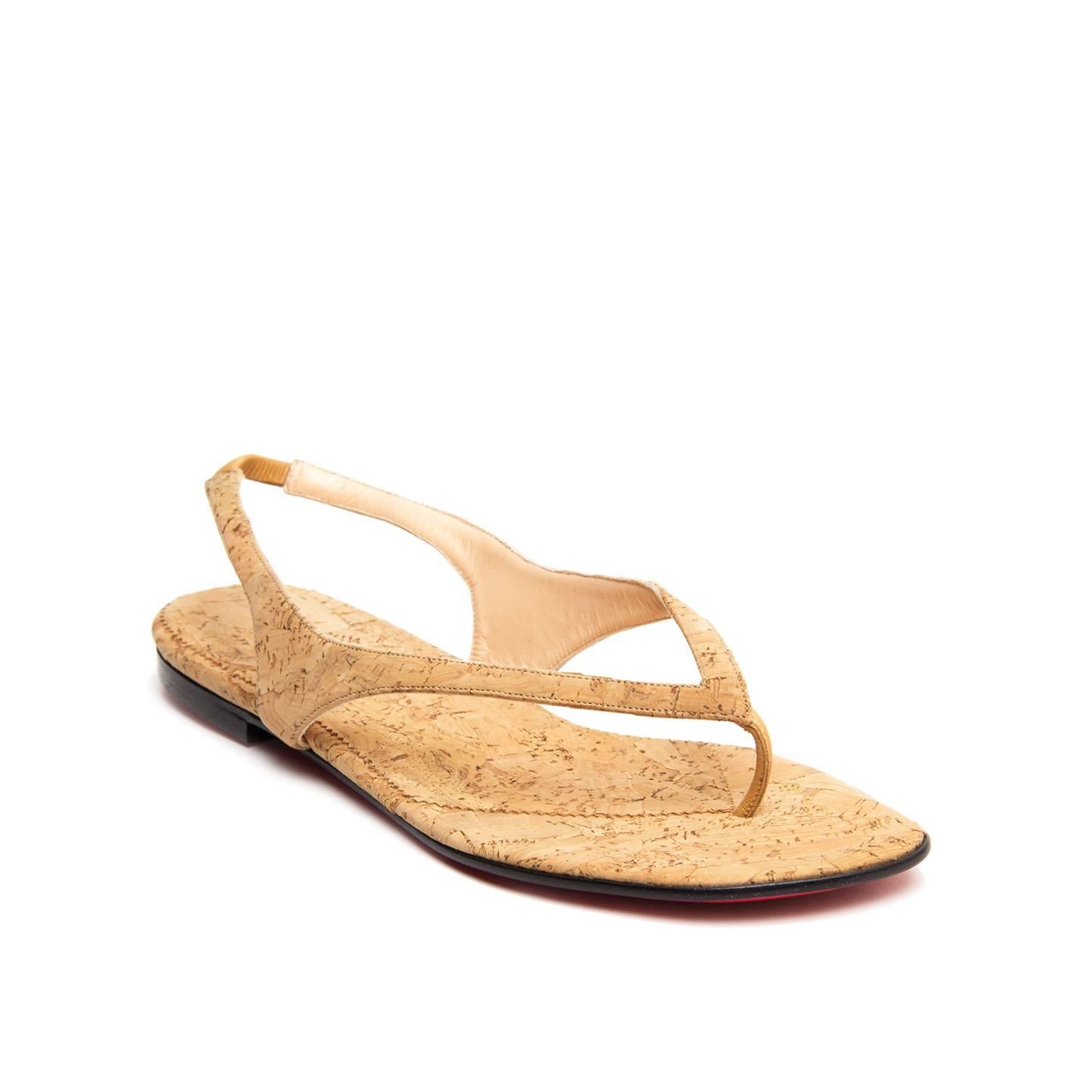 Solid cork thong sandals with sling back. Vero Cuoio. Made in Italy.

Size  40 Italian sizing

Condition  Excellent: never worn