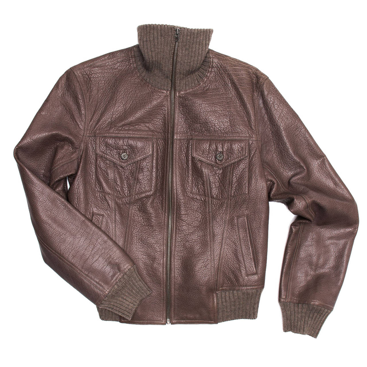 Bison leather classic bomber style jacket with ribbed bands at collar, cuffs and hem. The front is enriched by two flap pockets at bust that fasten with dark little buttons and slash pockets at waist. All the reams are decorated by tone-on-tone top