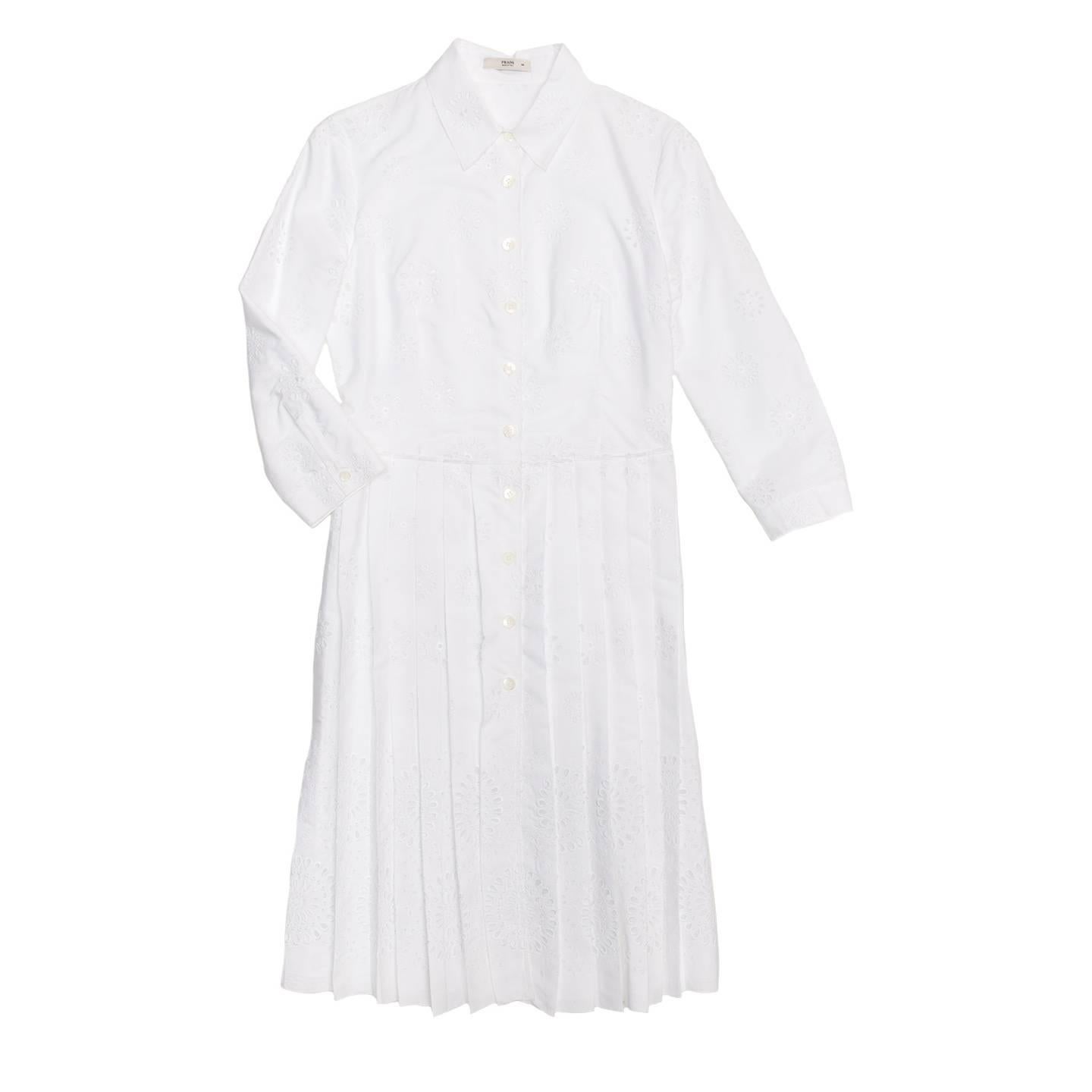 White cotton broderie anglaise shirtdress with knee length pleated skirt.

Size  44 Italian sizing

Condition  Excellent: worn a few times