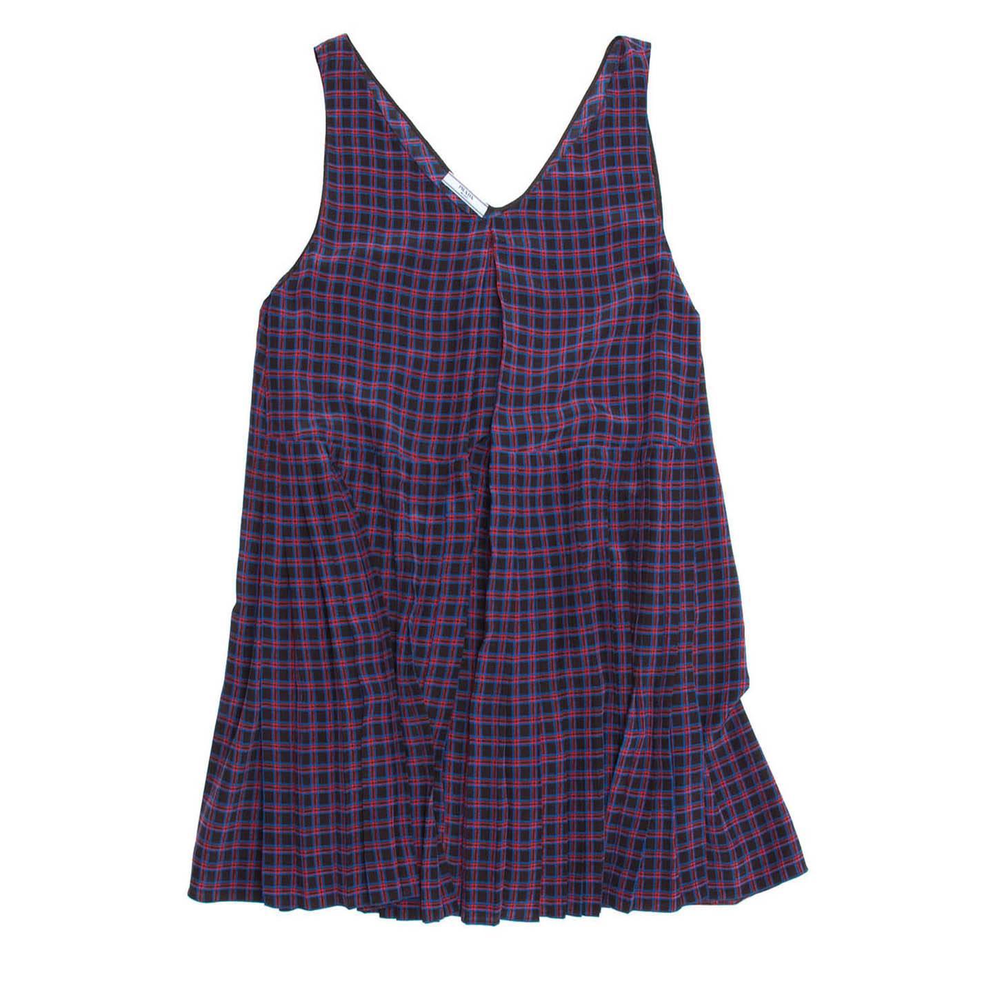 Blue, black, and red small plaid sleeveless boxy cut baby doll above knee length silk dress. Inverted pleat from necklne down at front and back and pleated hem skirt.

Size  42 Italian sizing

Condition  Excellent: worn once