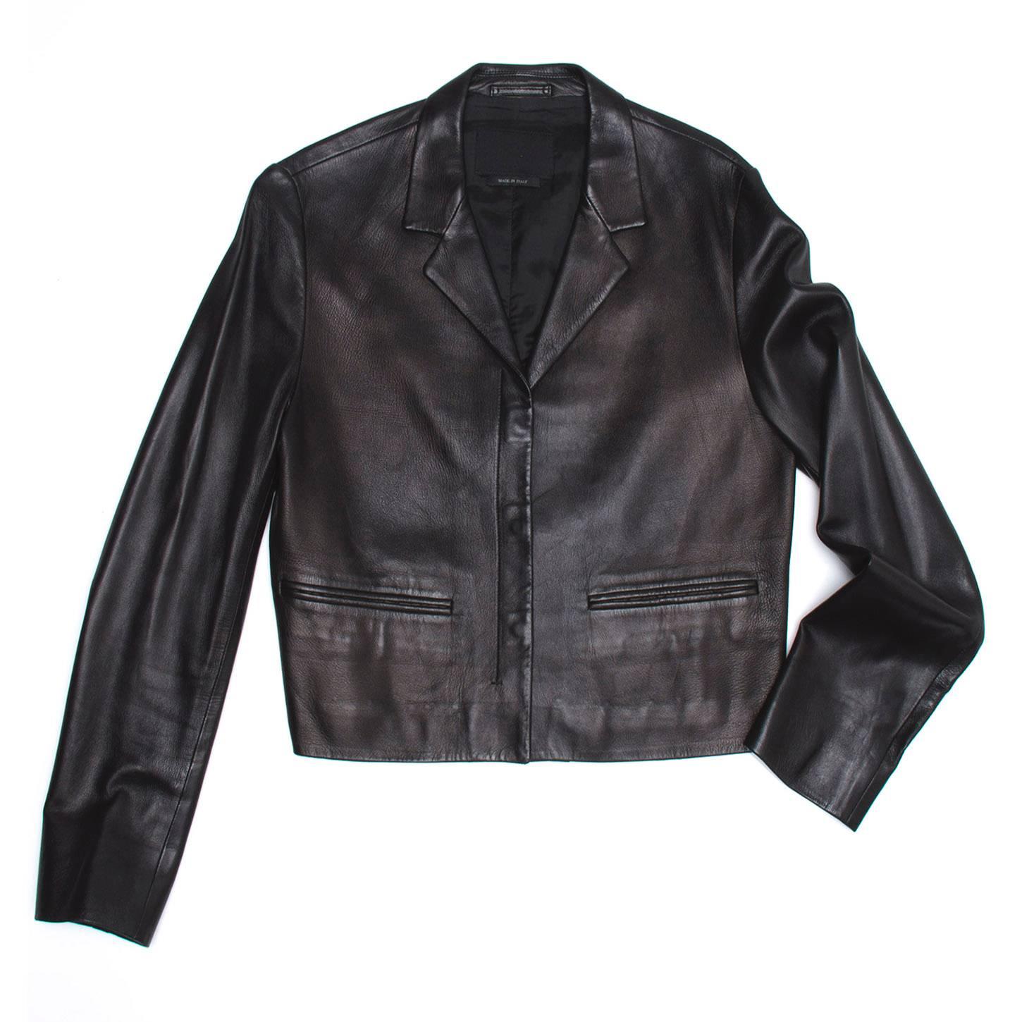 Black soft nappa leather cropped jacket with rounded snap button collar.

Size  42 Italian sizing

Condition  Good: worn with love and has some minor fading