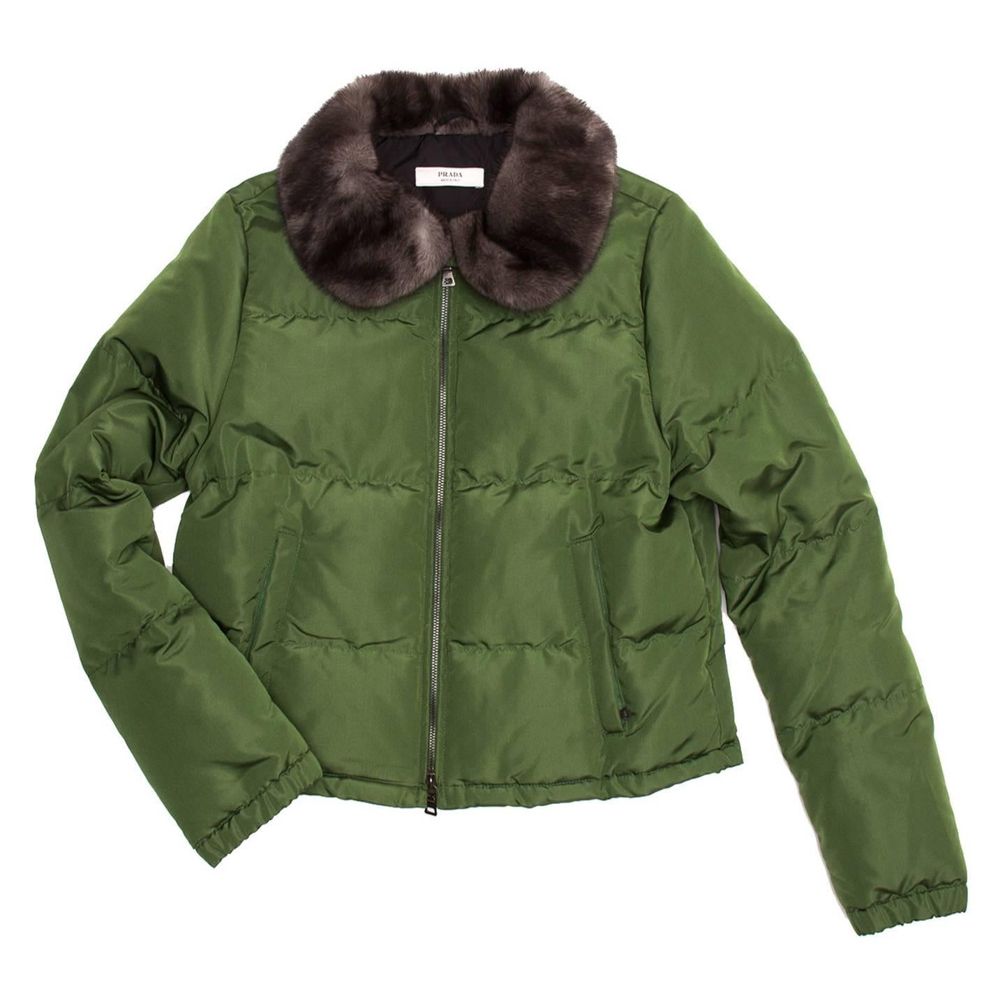 Bright green cropped goose down quilted jacket. The outer layer is a blend of silk and polyester and the peter pan collar is covered in mink fur.

Size  46 Italian sizing

Condition  Excellent: never worn
