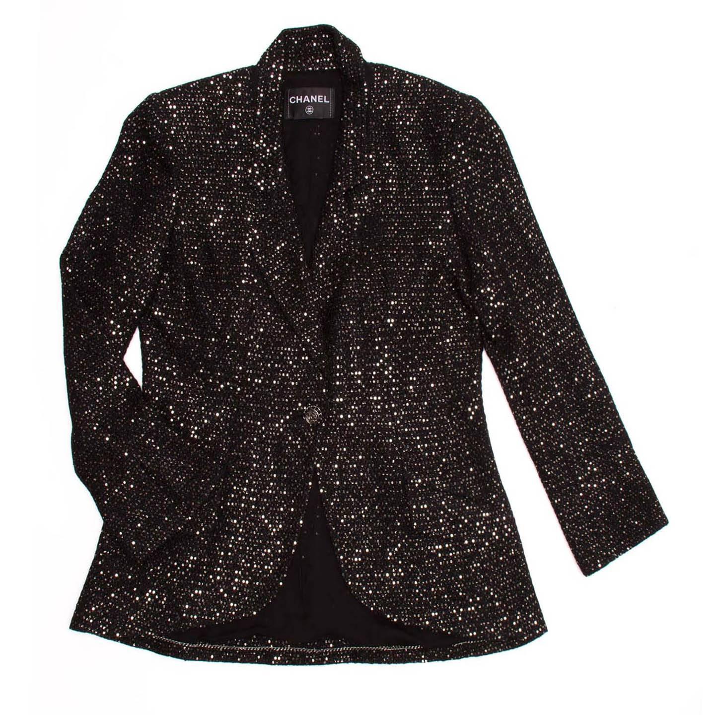 Black and gold sequin covered black wool tailored blazer with a single button closure and fold over cuff detail. 

Size  44 French sizing

Condition  Pristine and Excellent: never worn