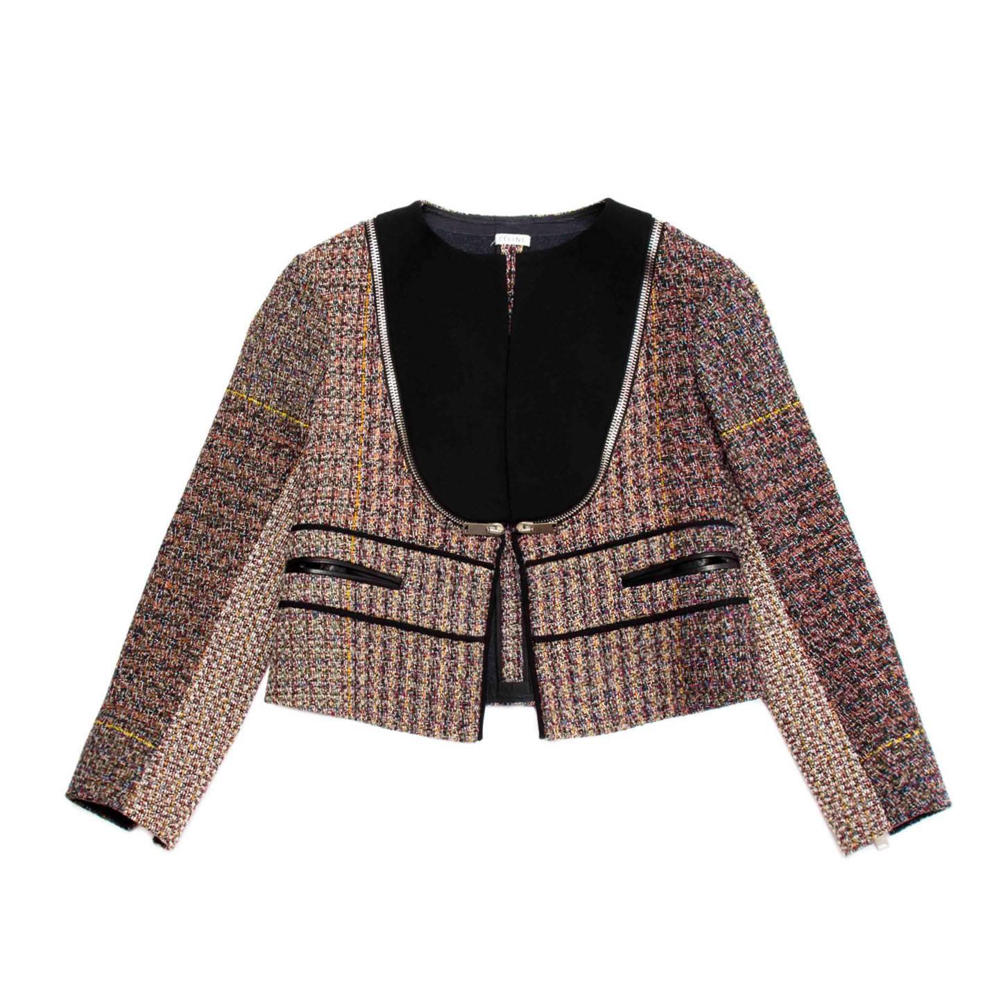 Multicolor tweed wool cropped jacket with open front and black bib detail. Silver metal zippers enrich the sleeves and the bib profile to continue towards the back on the whole length of the darts. A black piping highlights the waistband at front