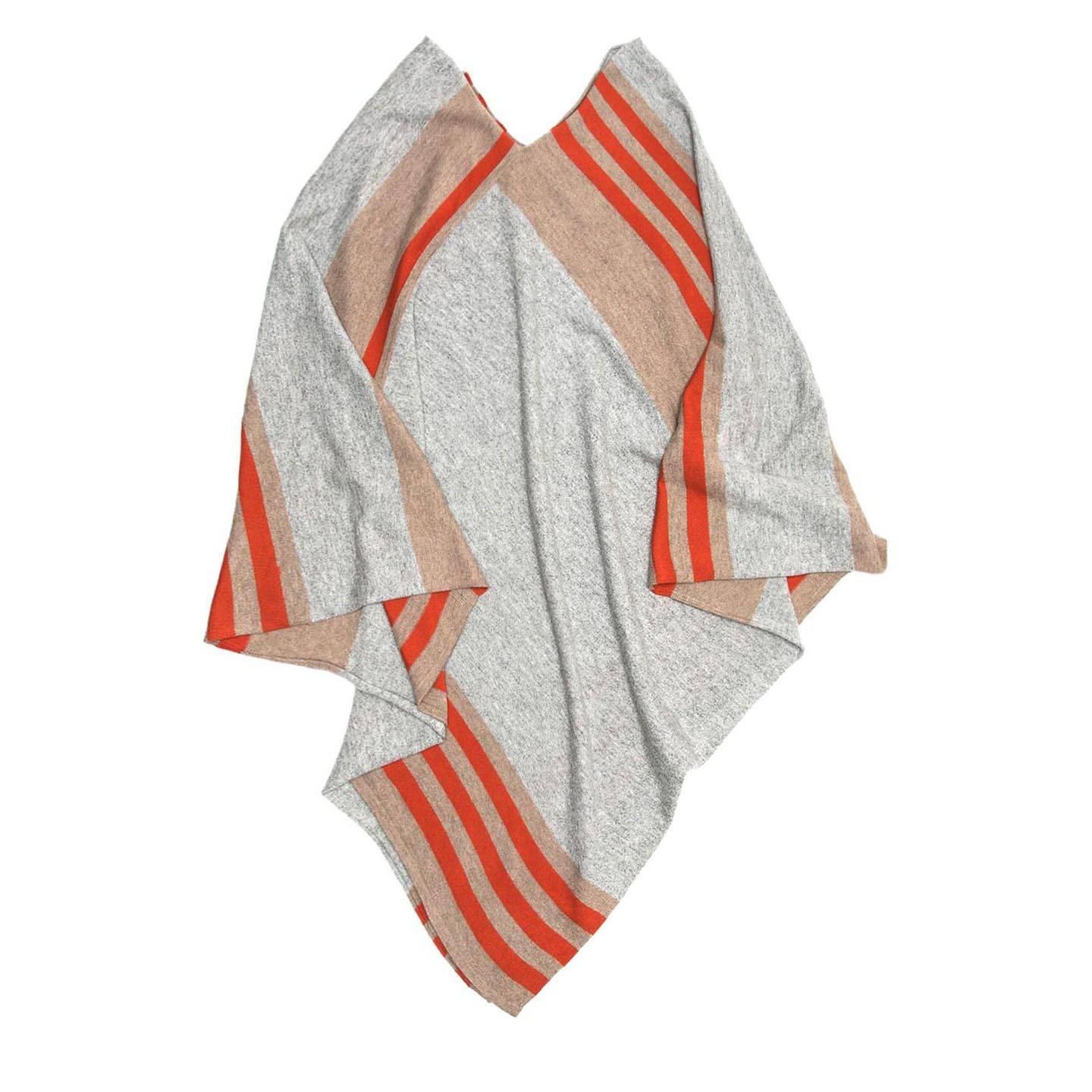 Grey cashmere knitted poncho with orange and khaki stripes. It is a constant design piece by Tomas Maier and this in particular was in his first collection. Made in Italy.

Size  One size

Condition  Excellent: worn once