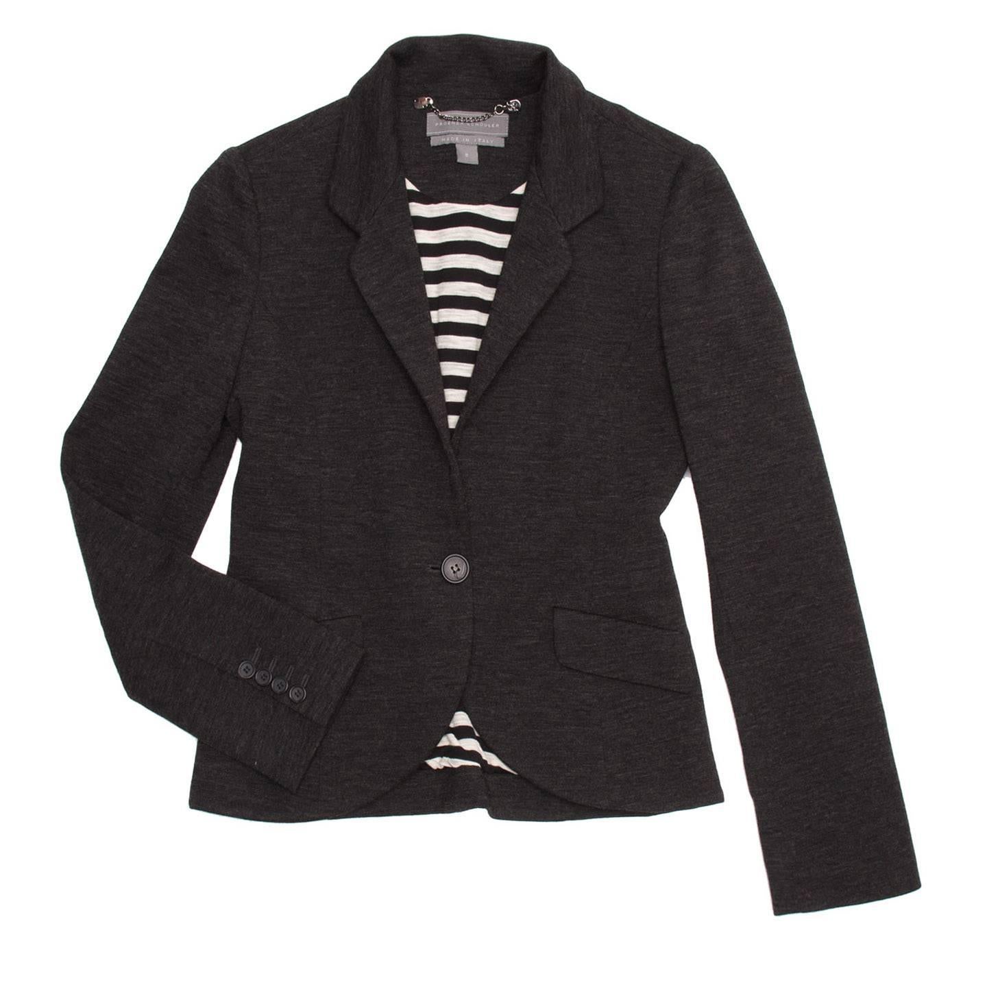 Charcoal heathered knit 1 buttoned blazer. 2 pocket flaps at front and 4 buttons at back cuff. Heathered horizontal stripe lining and small chain haner loop.

Size  8 US sizing

Condition  Excellent: never worn