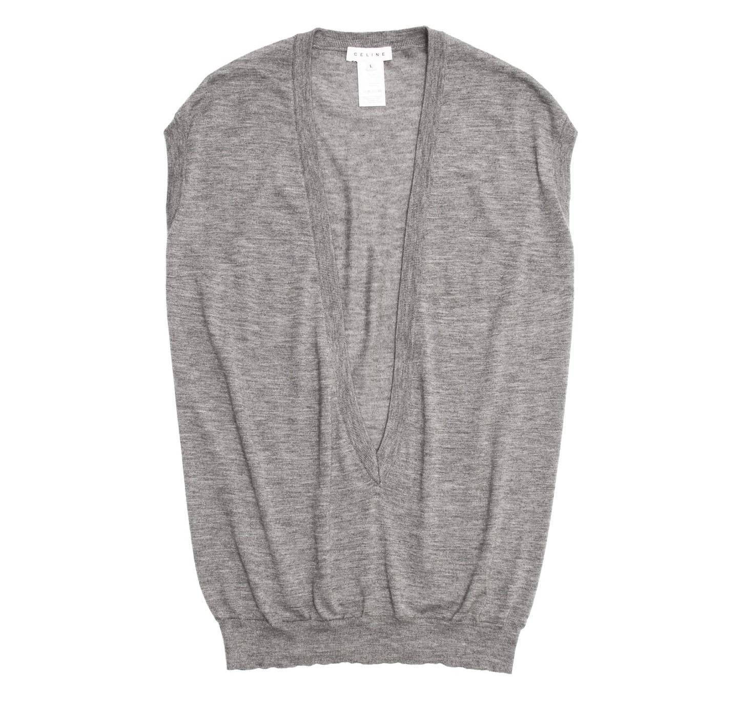 Grey cashmere long pullover vest with deep plunging V-neck opening. Made in Italy.

Size  L Universal sizing

Condition  Excellent: worn a few times