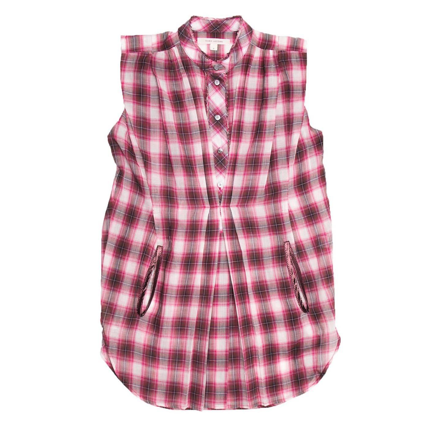 Red, black, grey and white plaid cotton sleeveless long shirt with raw edge inserts on Nehru collar and button placket. Round shaped hem with detailed side vents and front pockets enriched with satin profiles. Light pleats at front and little
