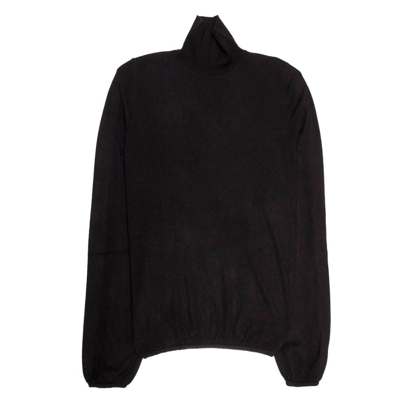 Black cashmere roll neck sweater with elastic gathers at hem and cuffs. Made in France.

Size  M Universal sizing 

Condition  Excellent: worn once