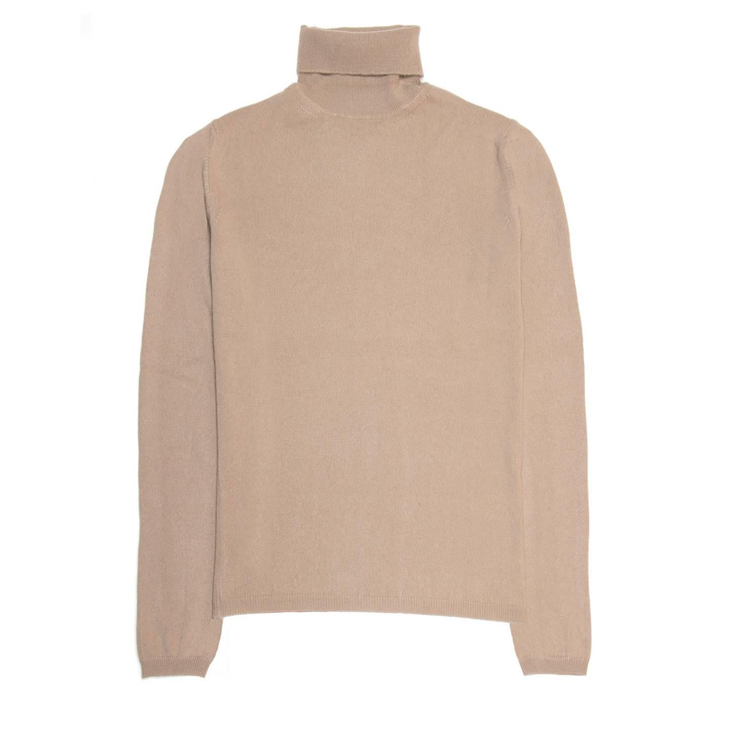 Light brown color cashmere knit rollover turtleneck.

Size  42 French sizing

Condition  Excellent: worn once
 