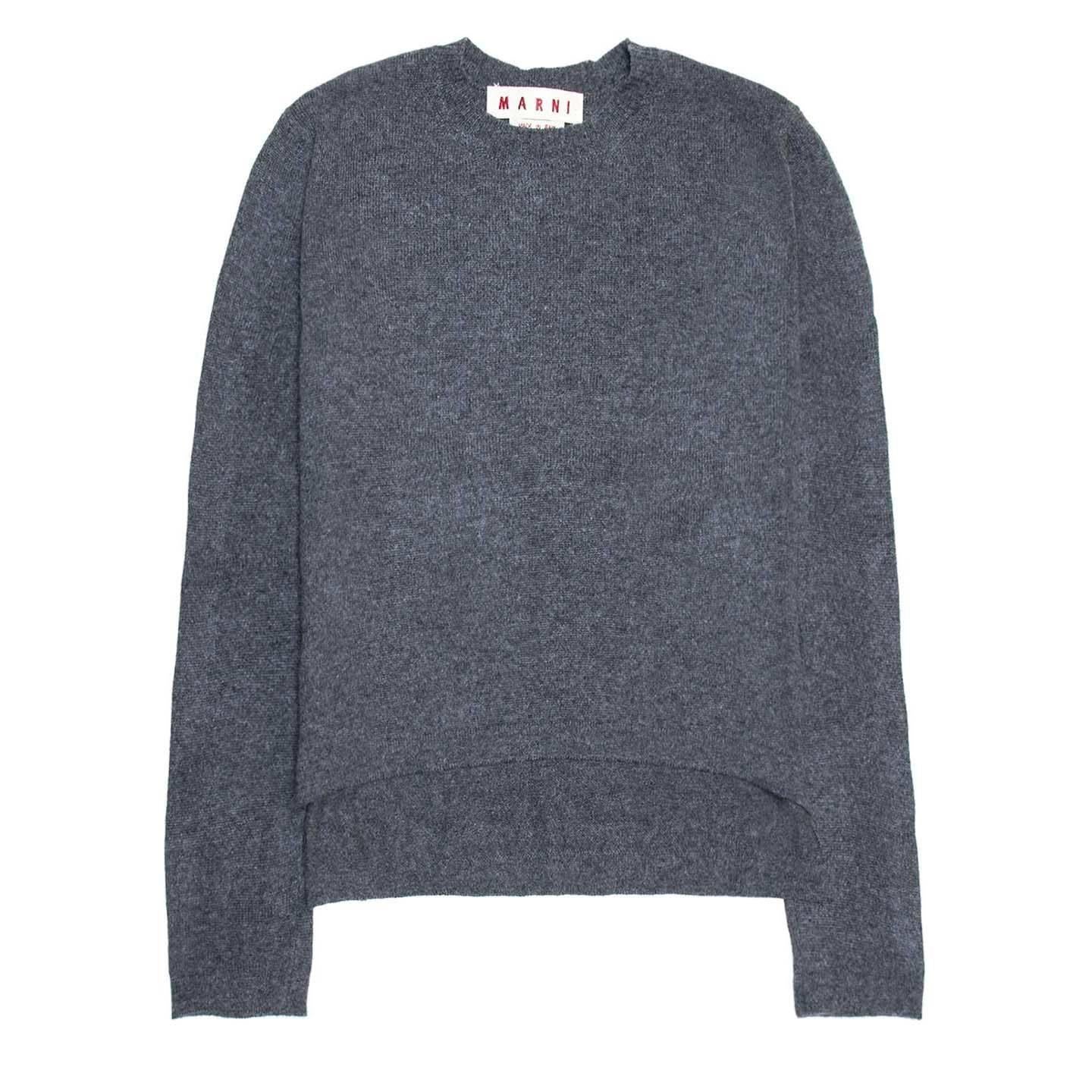 Charcoal grey crew neck cashmere pullover. The fit is boxy and the hem at the back is two inches longer than the front.

Size  44 Italian sizing

Condition  Excellent: never worn