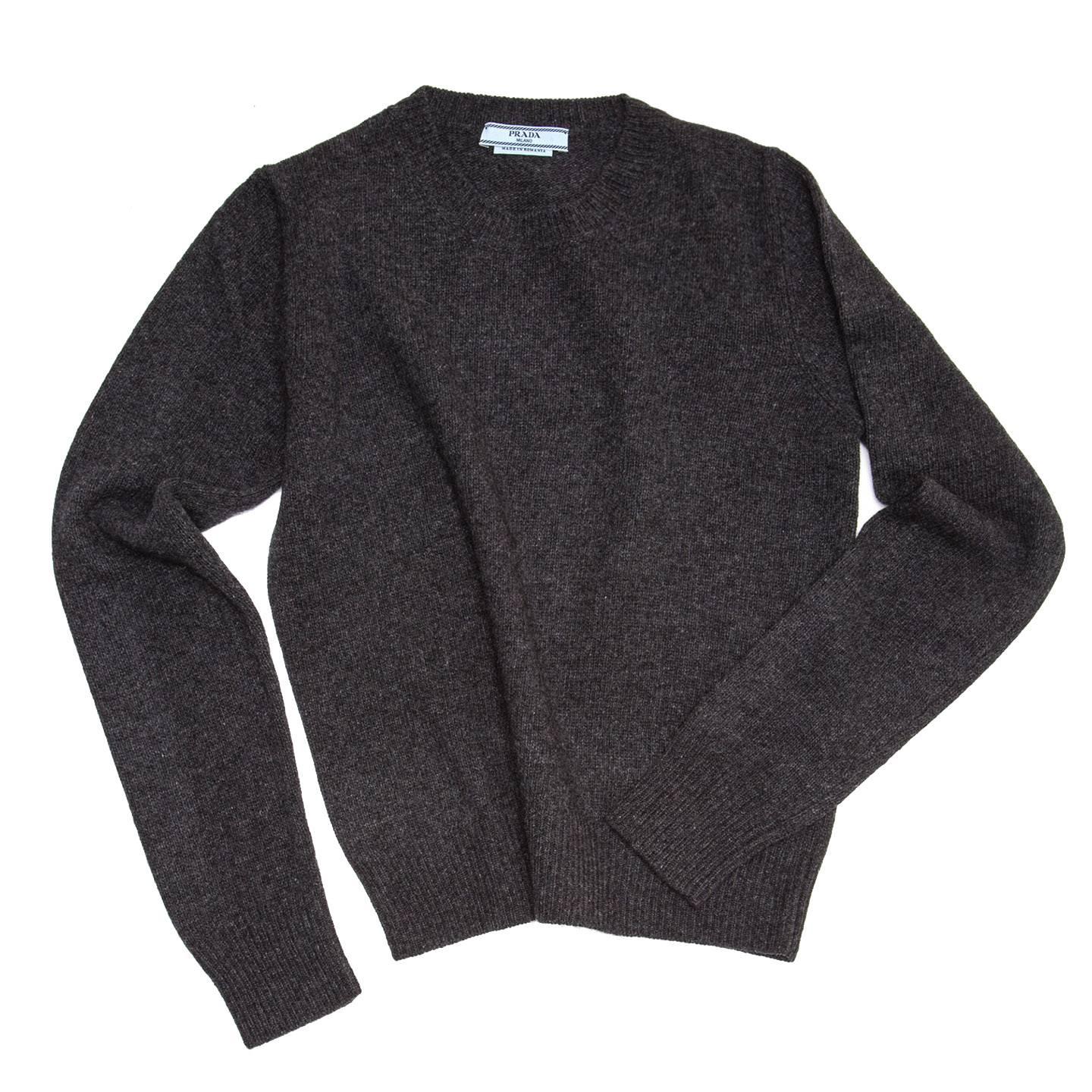 Prada charcoal grey cashmere and wool bland crew neck sweater.

Size  46 Italian sizing

Condition  Excellent: never worn