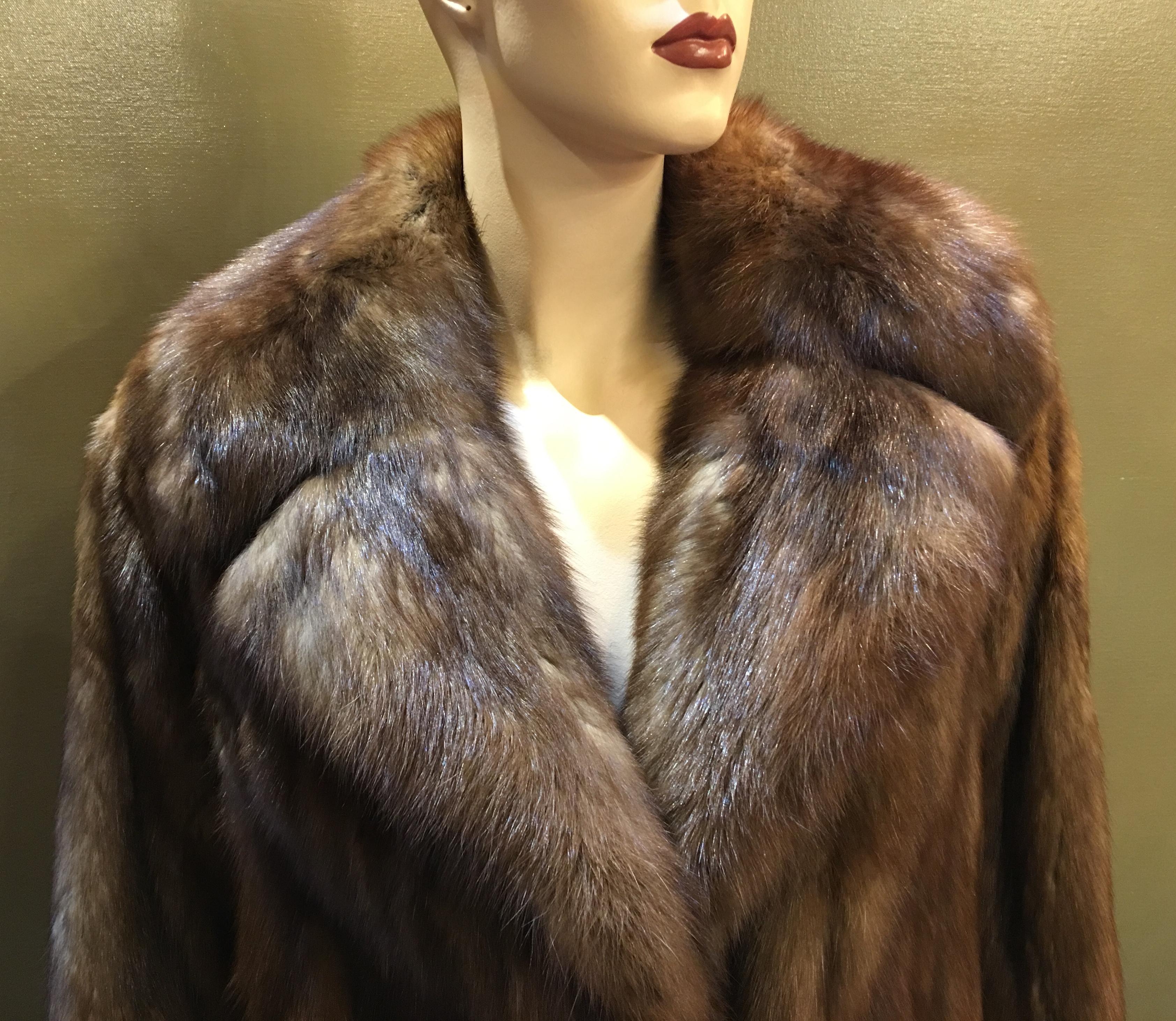 Shown as the ultimate symbol of status and elegance, Russian Sable is considered to be the most coveted fur in the world. This Russian sable fur coat from Michael's Furs of Los Angeles is a classic stroller length sable, featuring super soft and