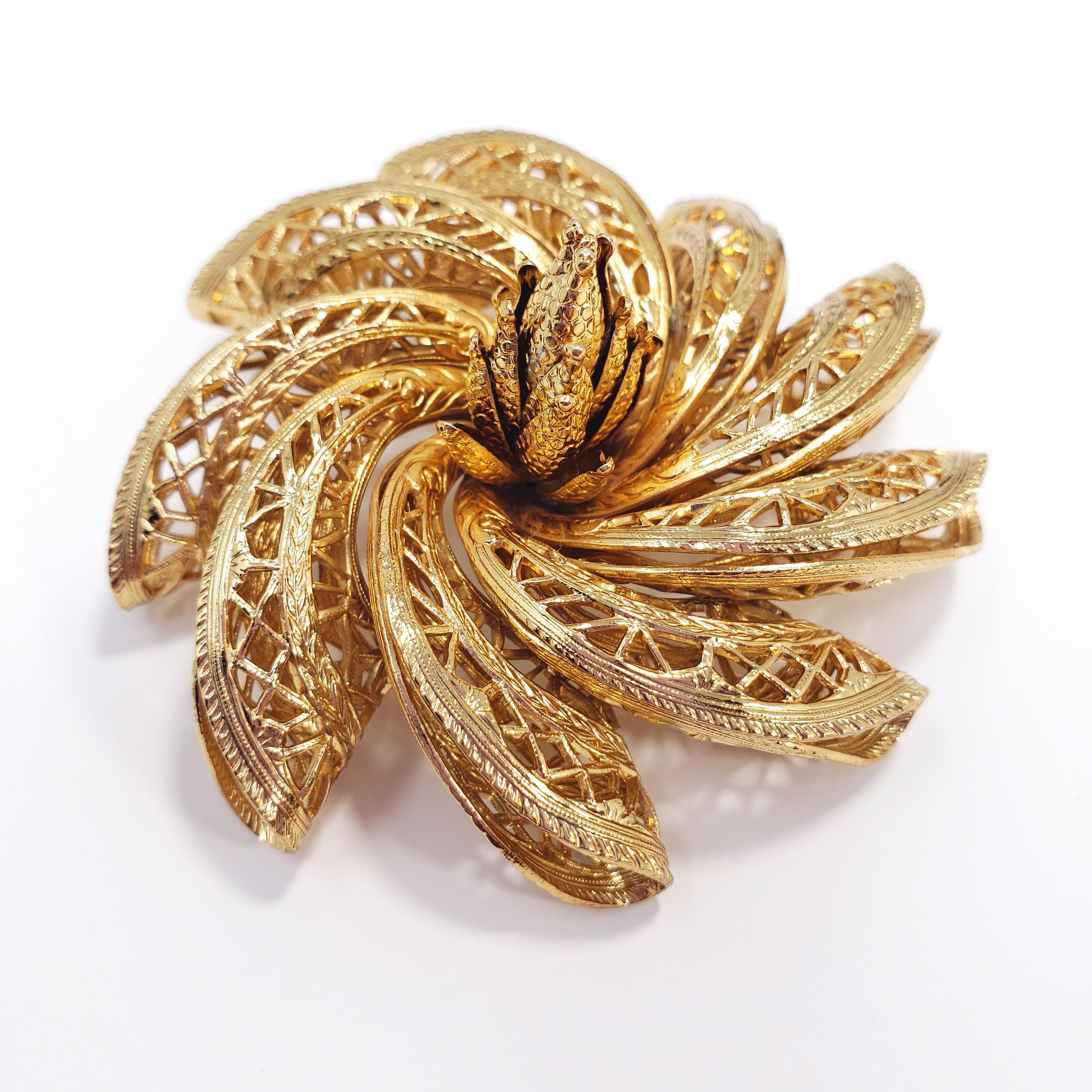 An exquisite 3-D brooch by Corocraft, featuring an intricate filigree petal pattern. Gold filled. Hallmarked © Corocraft.

