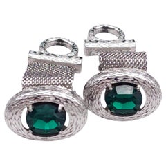 Gemelli avvolgenti in vetro verde smeraldo con rete color argento, anni '60