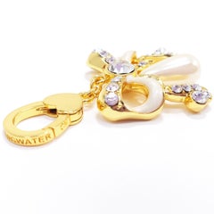 Jay Strongwater, fiocco di perle finte in oro, con smalto e cristalli