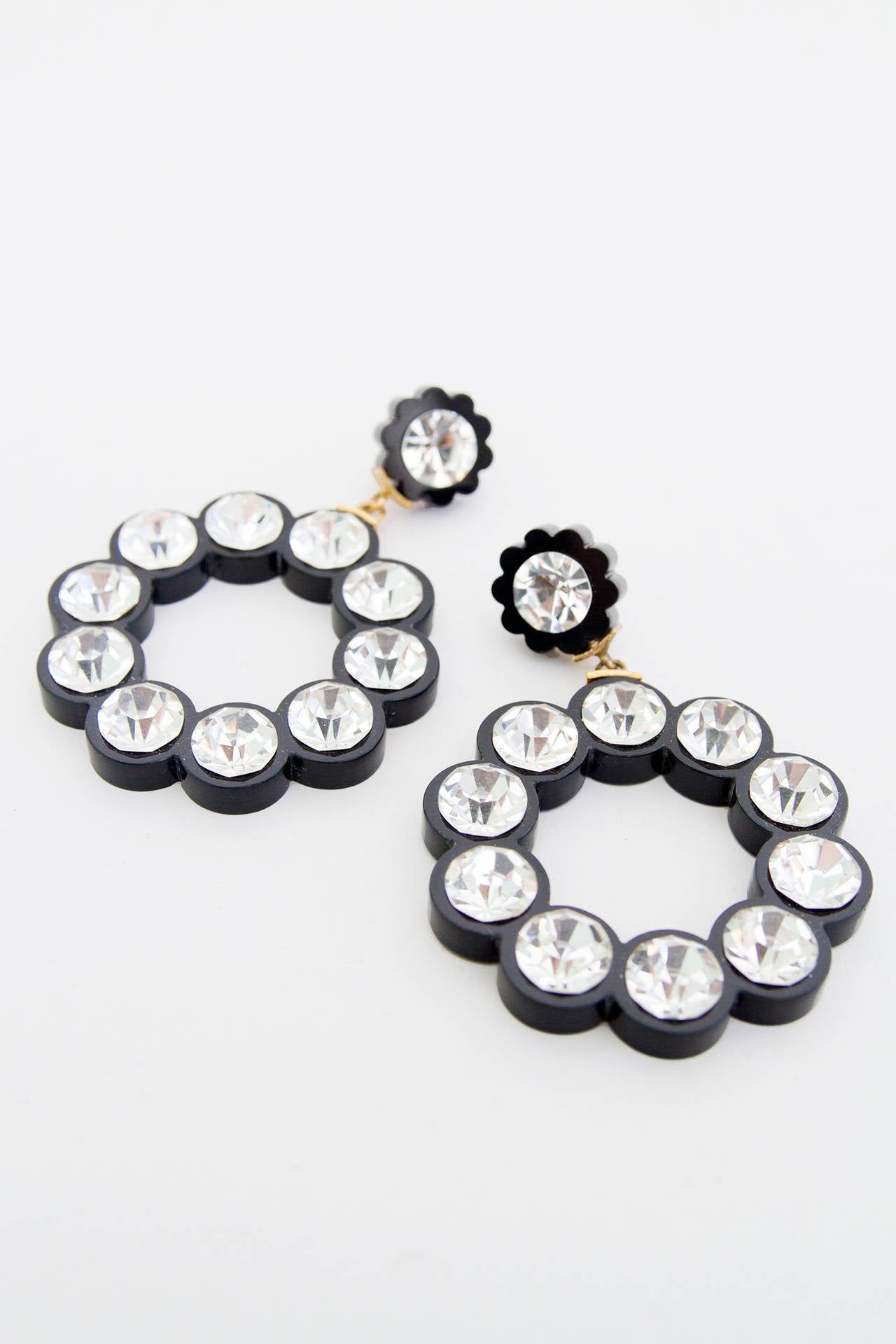 A pair of gorgeous 1980s Chanel clip on hoop earrings with large rhinestone settings.