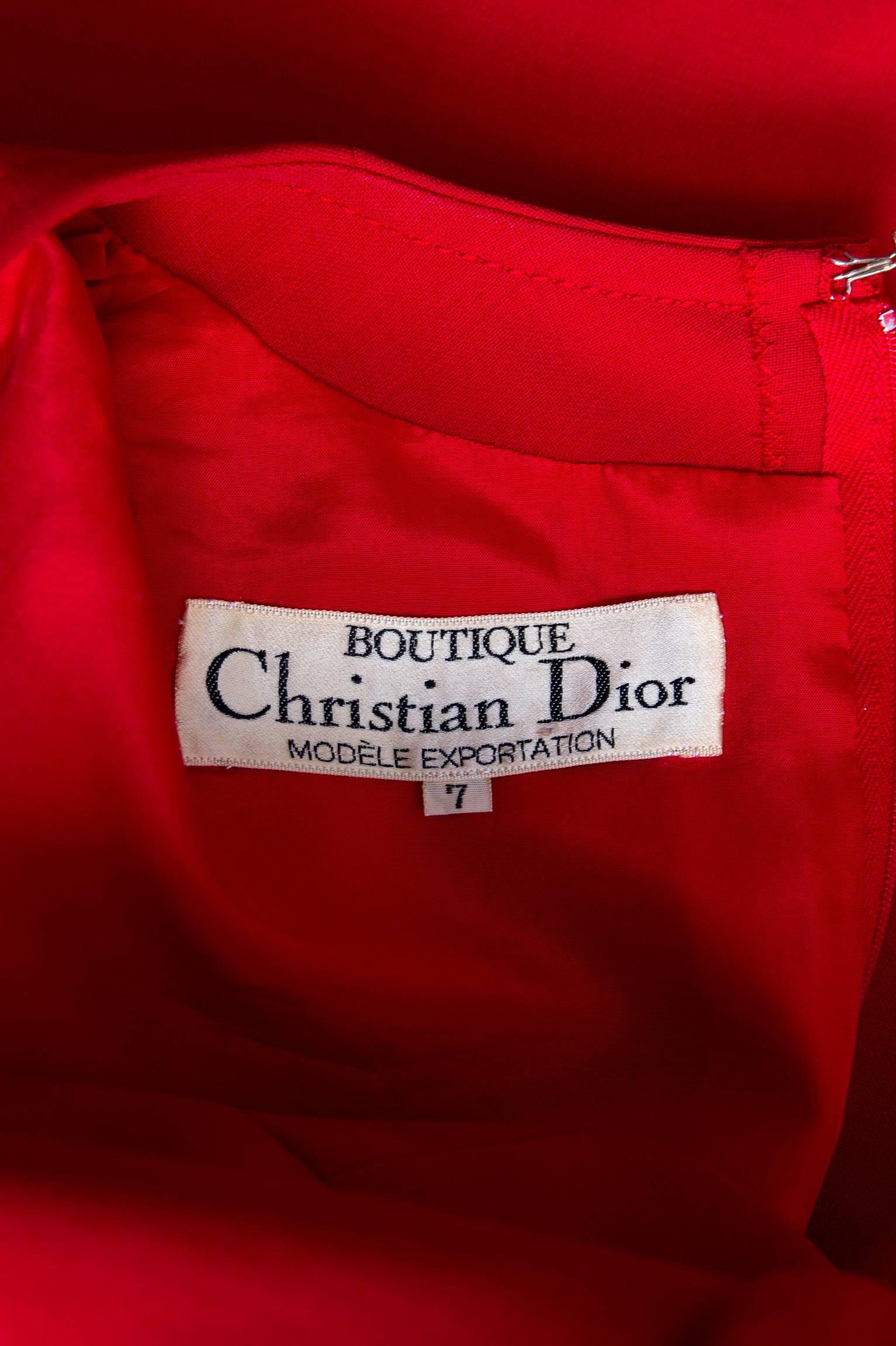 A stunning 1960s Christian Dior bright red a-line wool dress with long tapered sleeves and a round neckline. The little red dress features panel detailing down the from and has two small patch pockets situated on the bust area. The dress is fully