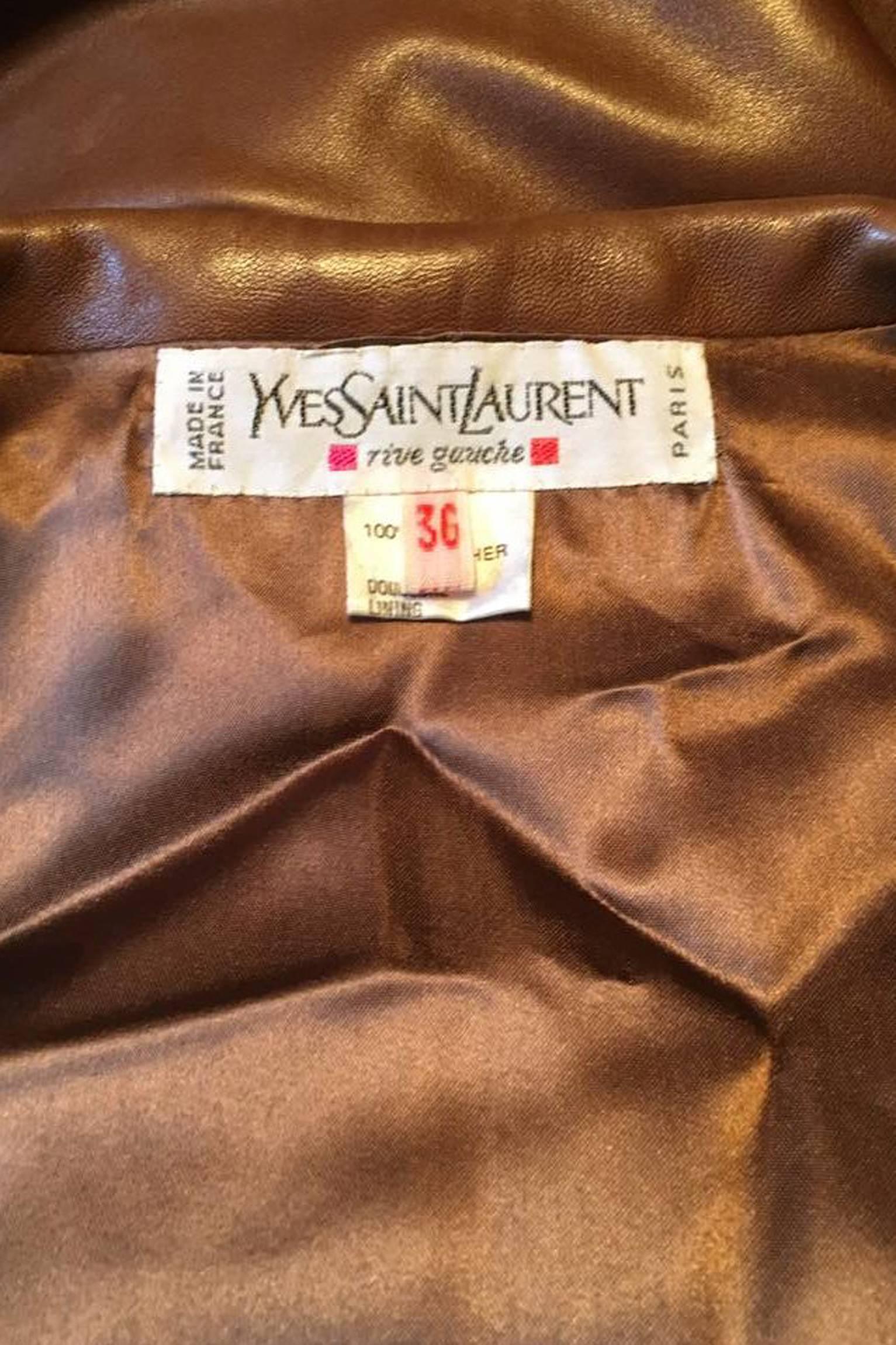 A gorgeous 1980s Yves Saint Laurent brandy colored cropped leather jacket with an open front and straight sleeves. The jacket has wide lapels, is fully lined and has shoulder-pads.

The size of the jacket corresponds to a modern size Small. 