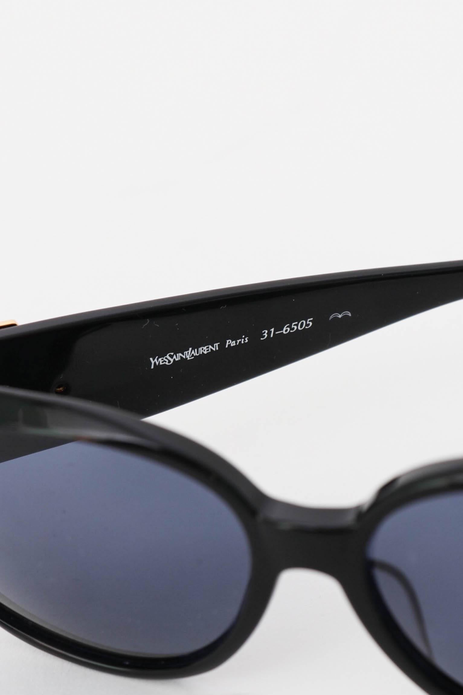 Gray A Pair of 1980s Black Yves Saint Laurent Gold YSL Logo Detail Sunglasses  For Sale