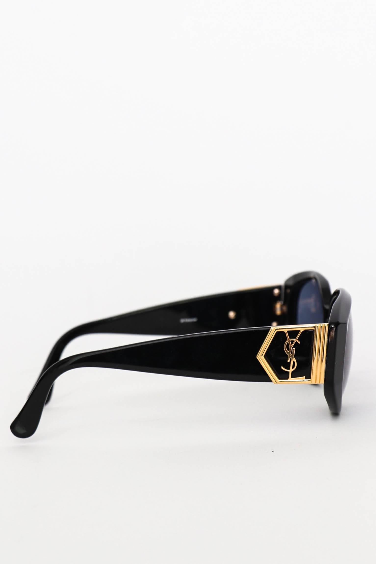 Women's or Men's A Pair of 1980s Black Yves Saint Laurent Gold YSL Logo Detail Sunglasses  For Sale